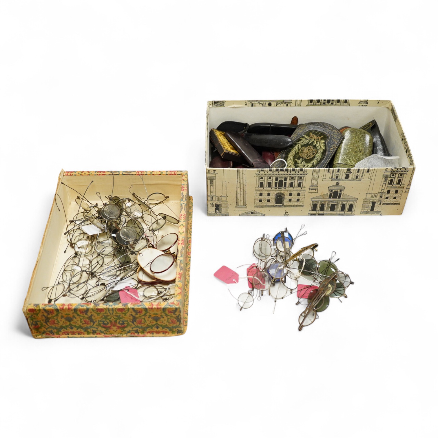 A large collection of 19th-century steel wire framed spectacles and a collection of 19th century leather, shagreen, embroidered etc. spectacle cases